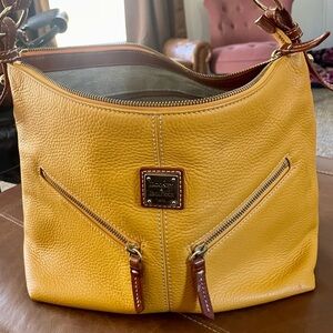Dooney & Bourke spring time Yellow Hobo Bag. In great condition gently used.